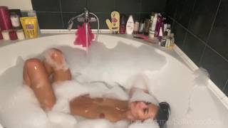 Exhibitionist Fondles Her Pussy In The Bathtub