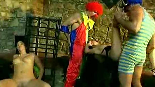 Clowns Fucking Chicks In A Group Scene