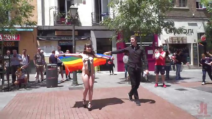 Brunette's Pride Parade With A Dildo Hanging On Her Neck