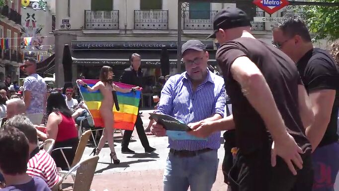 Brunette's Pride Parade With A Dildo Hanging On Her Neck