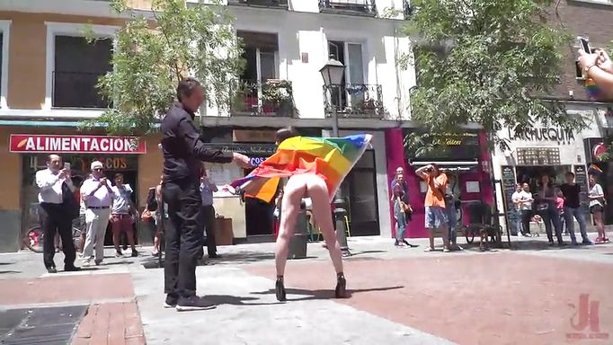 Brunette's Pride Parade With A Dildo Hanging On Her Neck