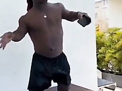 African Midget Dancing With A Bulge