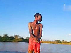 Skinny African Dude Public Bathing Bulge