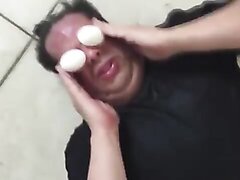 Woman Humiliates Slave With Eggs