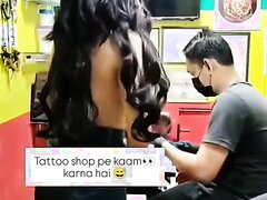 She Topless In Front Of Tattoo Designer