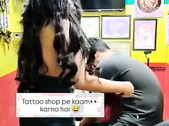 She Topless In Front Of Tattoo Designer