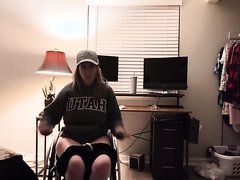 Paraplegic Putting Pants Of In Wheelchair