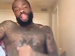 Dark Skinned Bearded Tatted Up Dude Flashing His Bbc