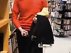 Nerdy Looking Guy Flashing At The Bookstore