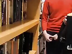 Nerdy Looking Guy Flashing At The Bookstore