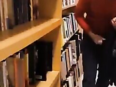 Nerdy Looking Guy Flashing At The Bookstore