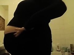 Huge Belly On Tight Clothes