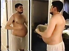 Daddy With Big Belly Brushes His Teeth After A Shower